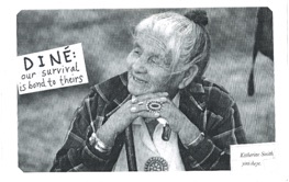Diné Zine Cover in black and white of Katherine Smith. Her hair in a bun and her jaw resting on her clasped hands adorned with a large ring