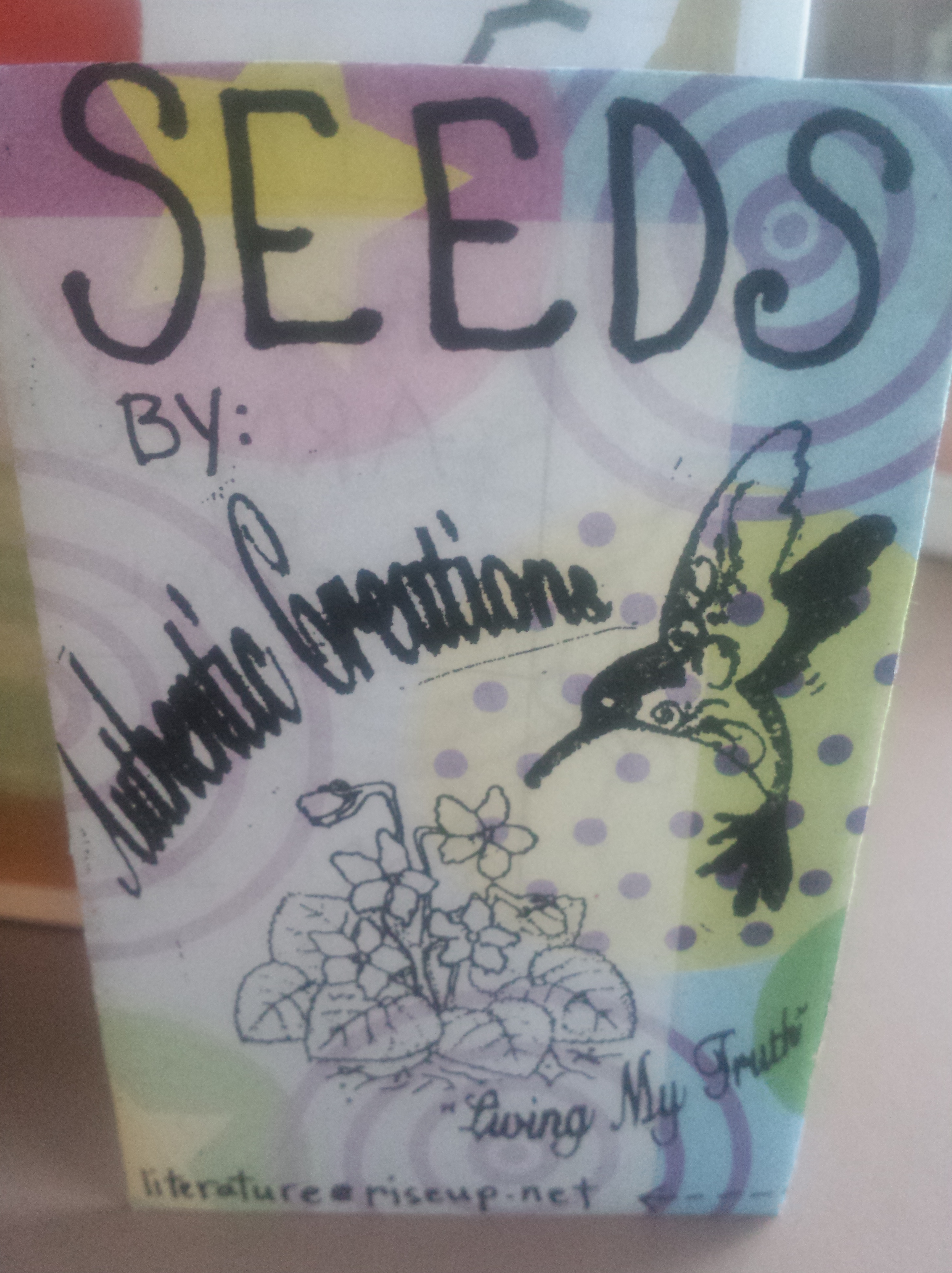 Seeds by Authentic Creatons above hummingbird logo and slogan ;living my truth;