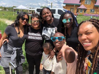 A group of 7 poses at the Food Symposium