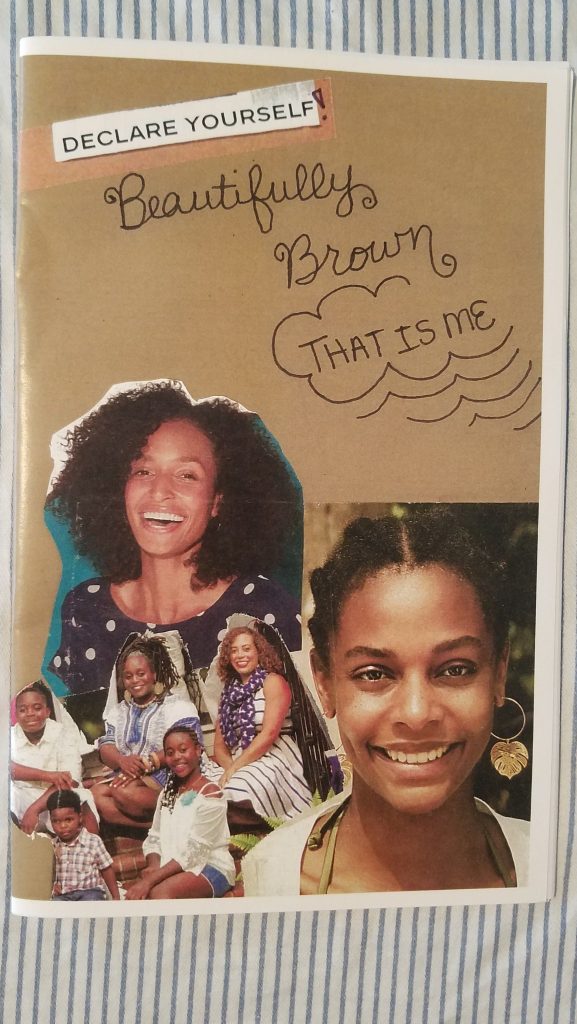 that is me zine cover has joyful Afro faces on brown paper
