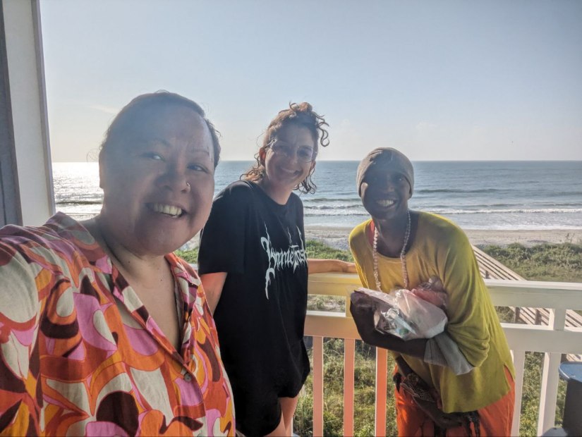 Advisory Council on balcony with backdrop of the Ocean during our Leadership Summit.