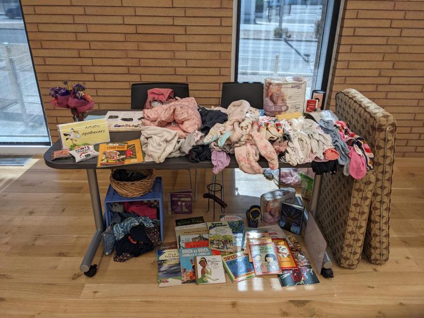 Our second Community Baby Shower at the Library our table loaded with wellness, literature and freebies!!